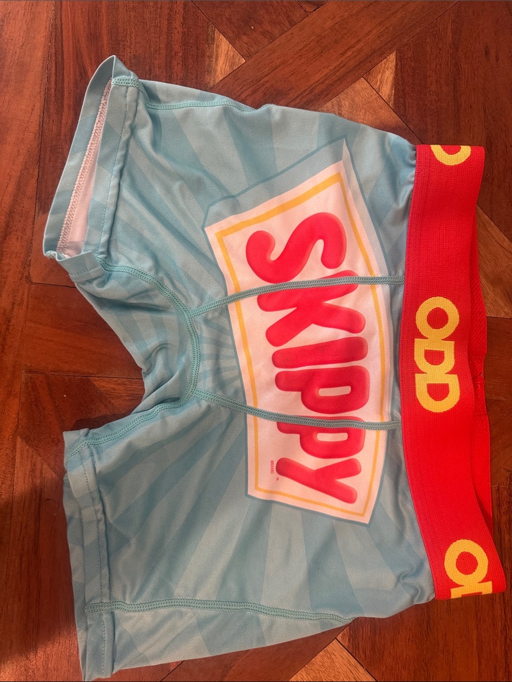 Odd Future Kids' Light Blue 'Skippy' Swim Trunks with Red Waistband